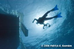 Sillouette of my wife, Debra, returning to the T&C Aggres... by Patrick Reardon 